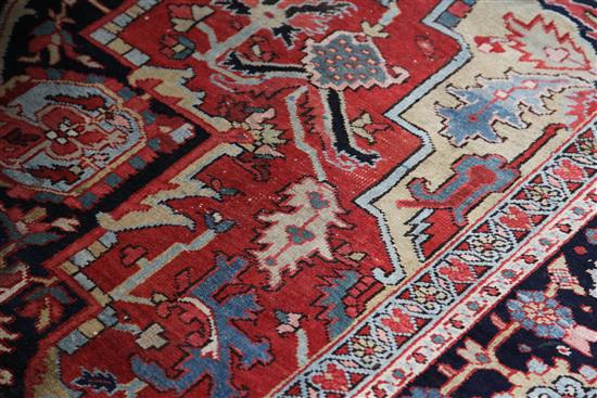 A Heriz carpet, 11ft 10in by 9ft 2in.